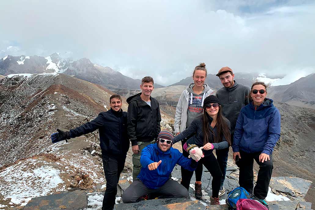 Tourists enjoying high-altitude landscapes and snow-capped mountains