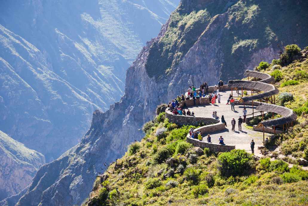 Tourists at the Cruz del Condor lookout point in Arequipa