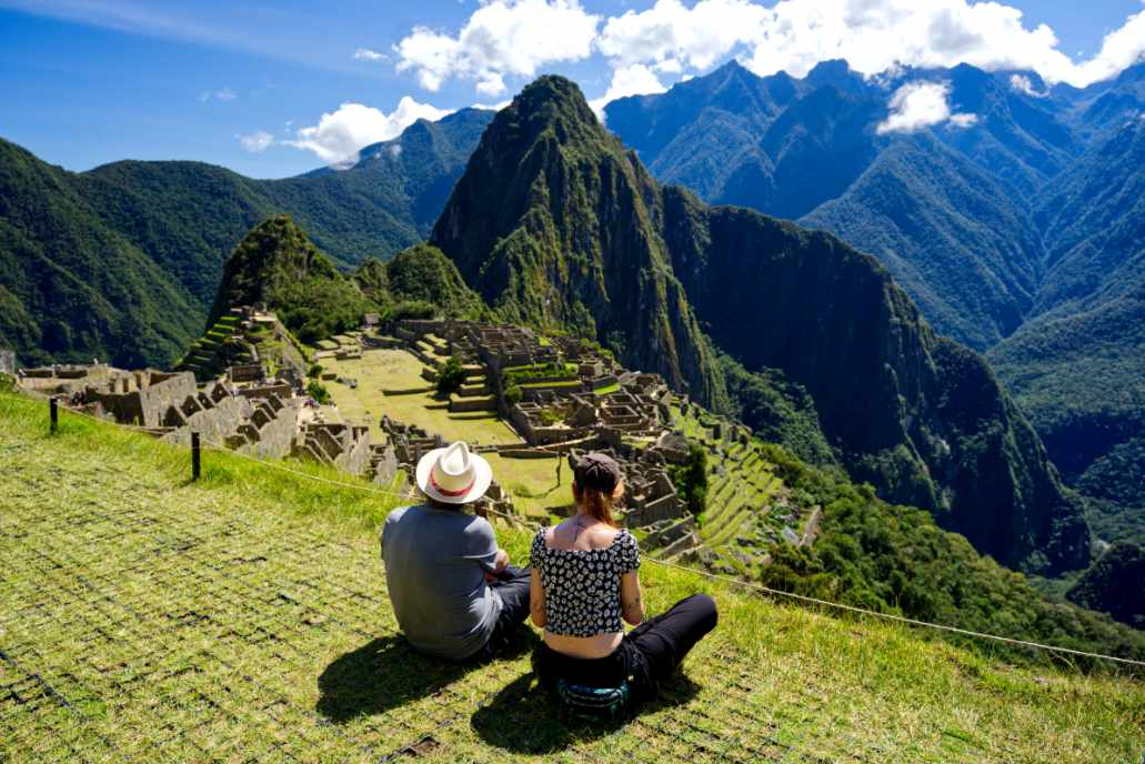 Tourist couple observing the Inca citadel